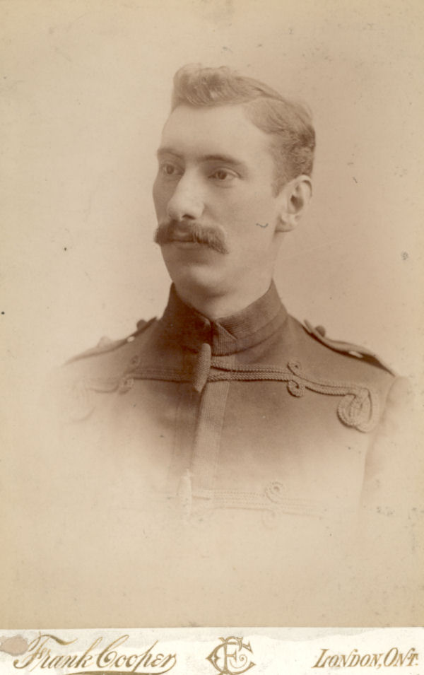 A photo of a mustachioed soldier, Capt. Henry Ardagh Kingsmill, taken at Frank Cooper's photo studio in London, ON.